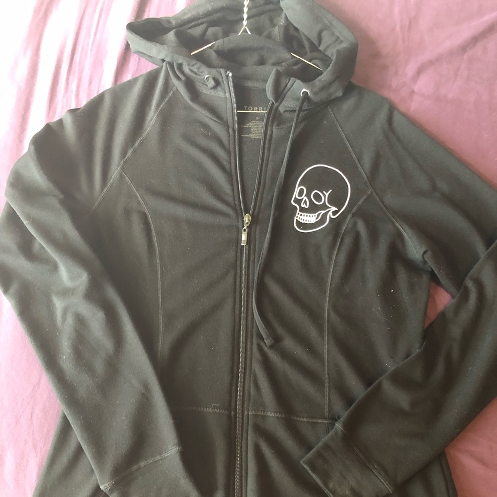 Torrid zip up hoodie with white skull embroidery